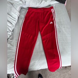 Red men’s adidas track pants